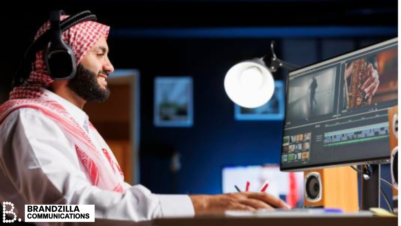 Person working at a computer desk.